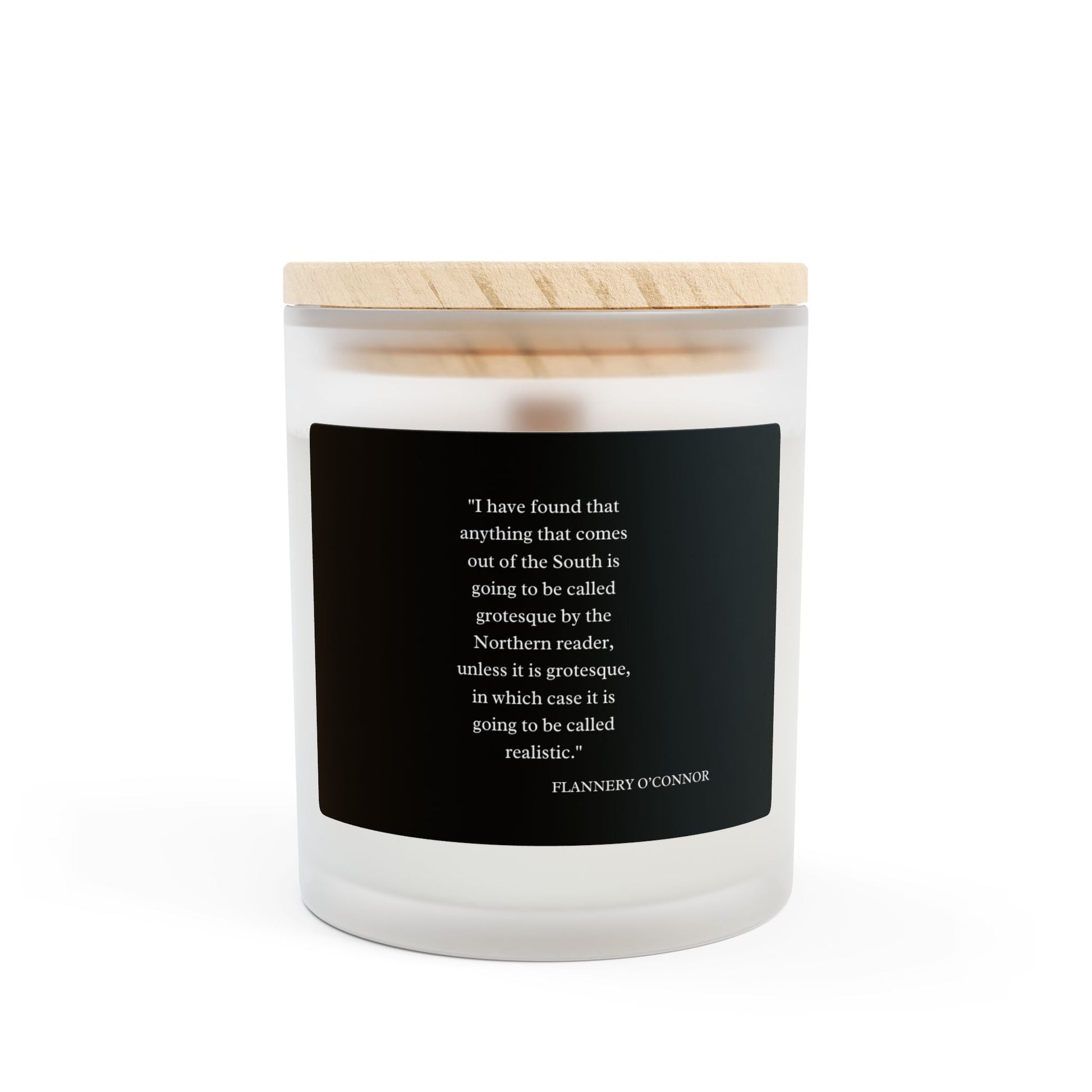 Flannery O'Connor Quote Candle in frosted glass with maple lid, featuring coconut soy wax and wooden wick.