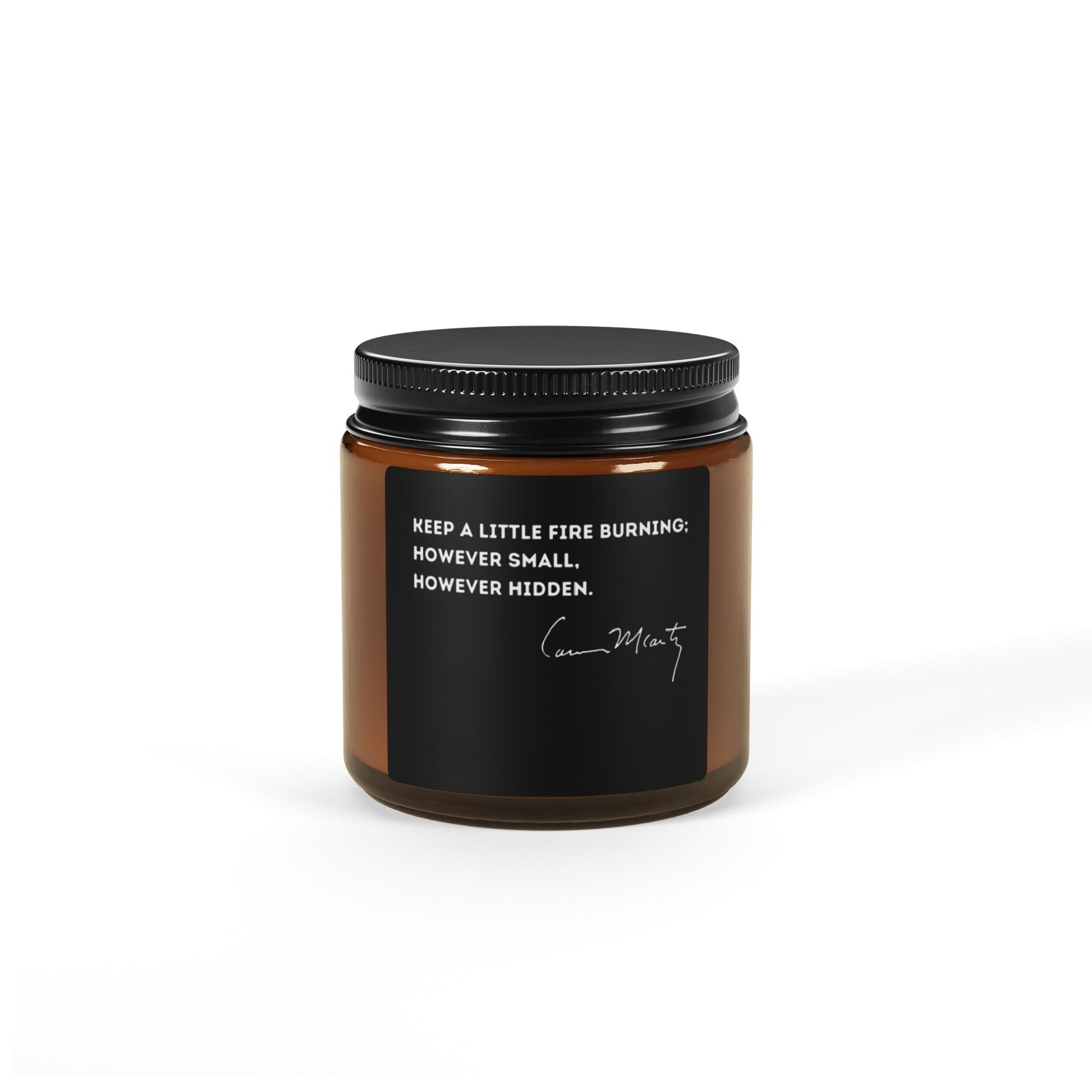 Cormac McCarthy Quote Scented Candle in amber jar, eco-friendly soy, inspired by Southern Gothic literature.