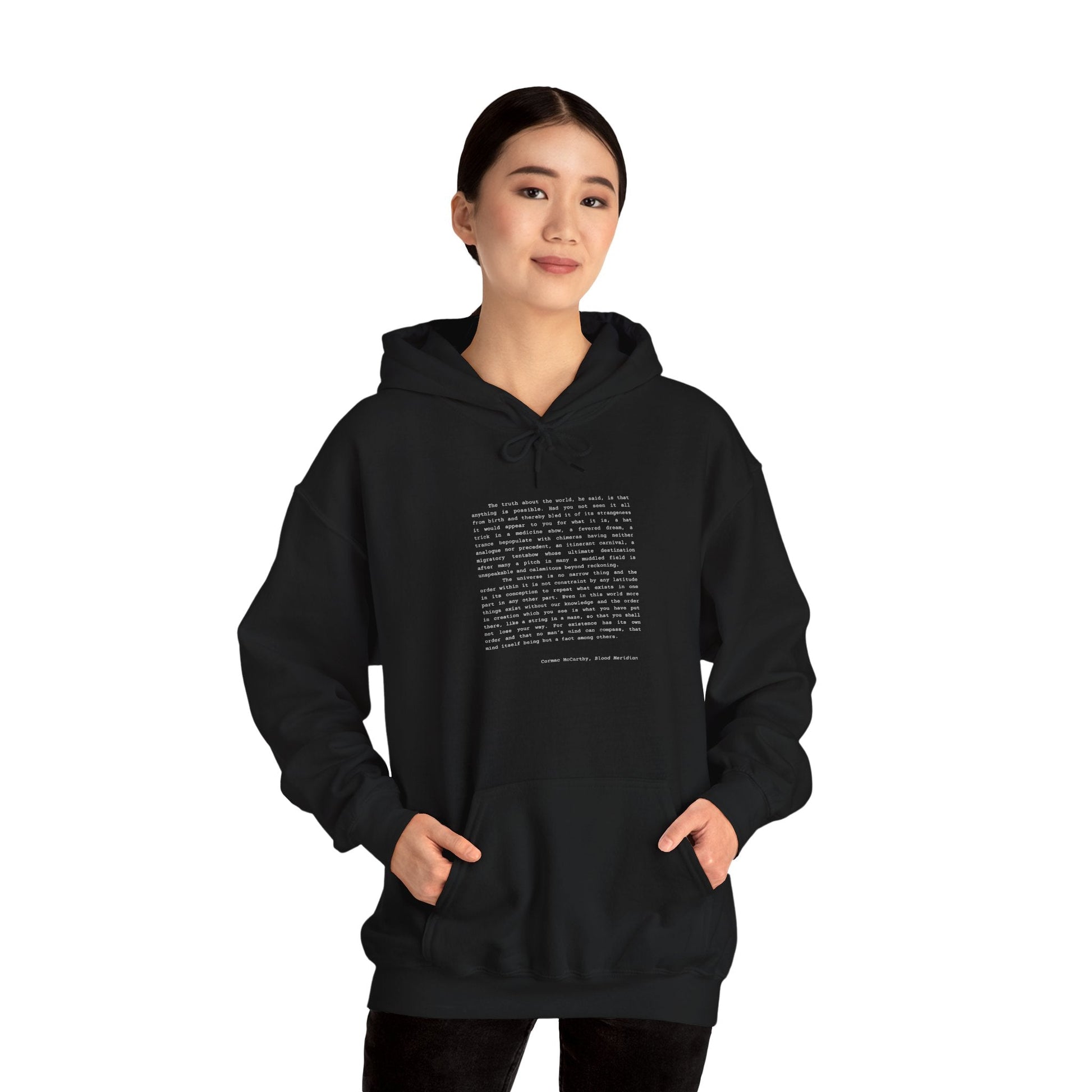 Black hoodie featuring a quote from Cormac McCarthy's "Blood Meridian".