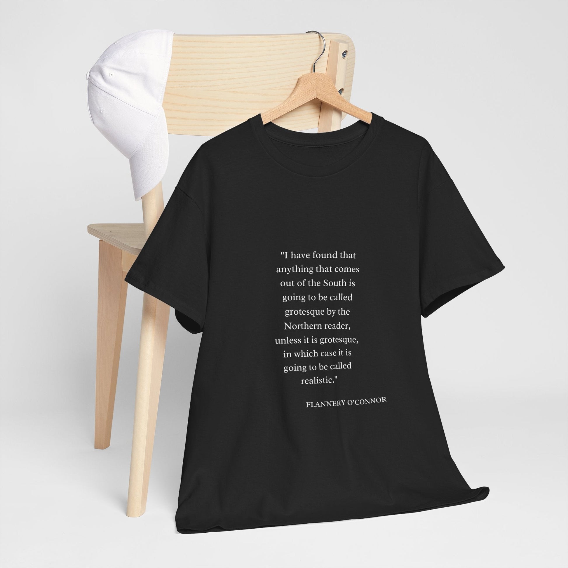 Flannery O'Connor quote T-shirt featuring elegant typography on high-quality black fabric