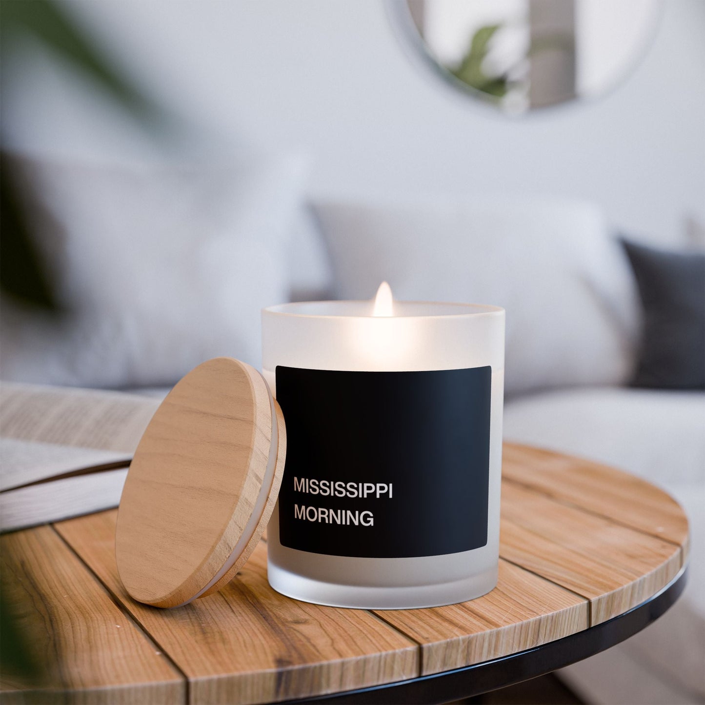 William Faulkner Mississippi Morning Candle in frosted glass with wooden lid.